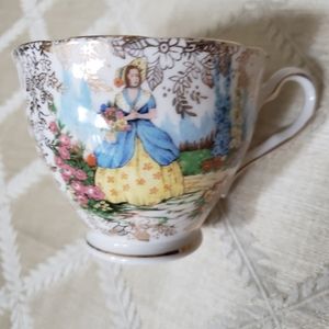 Colclough 1940's cup and saucer in the Lady Pompador pattern.